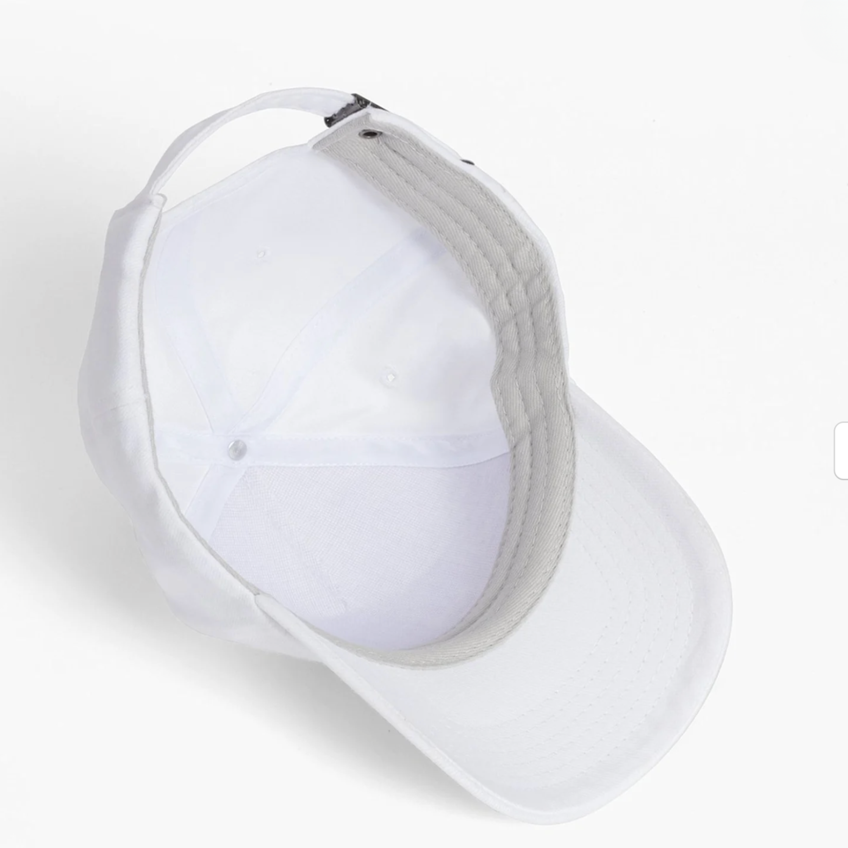 White baseball cap on a white background