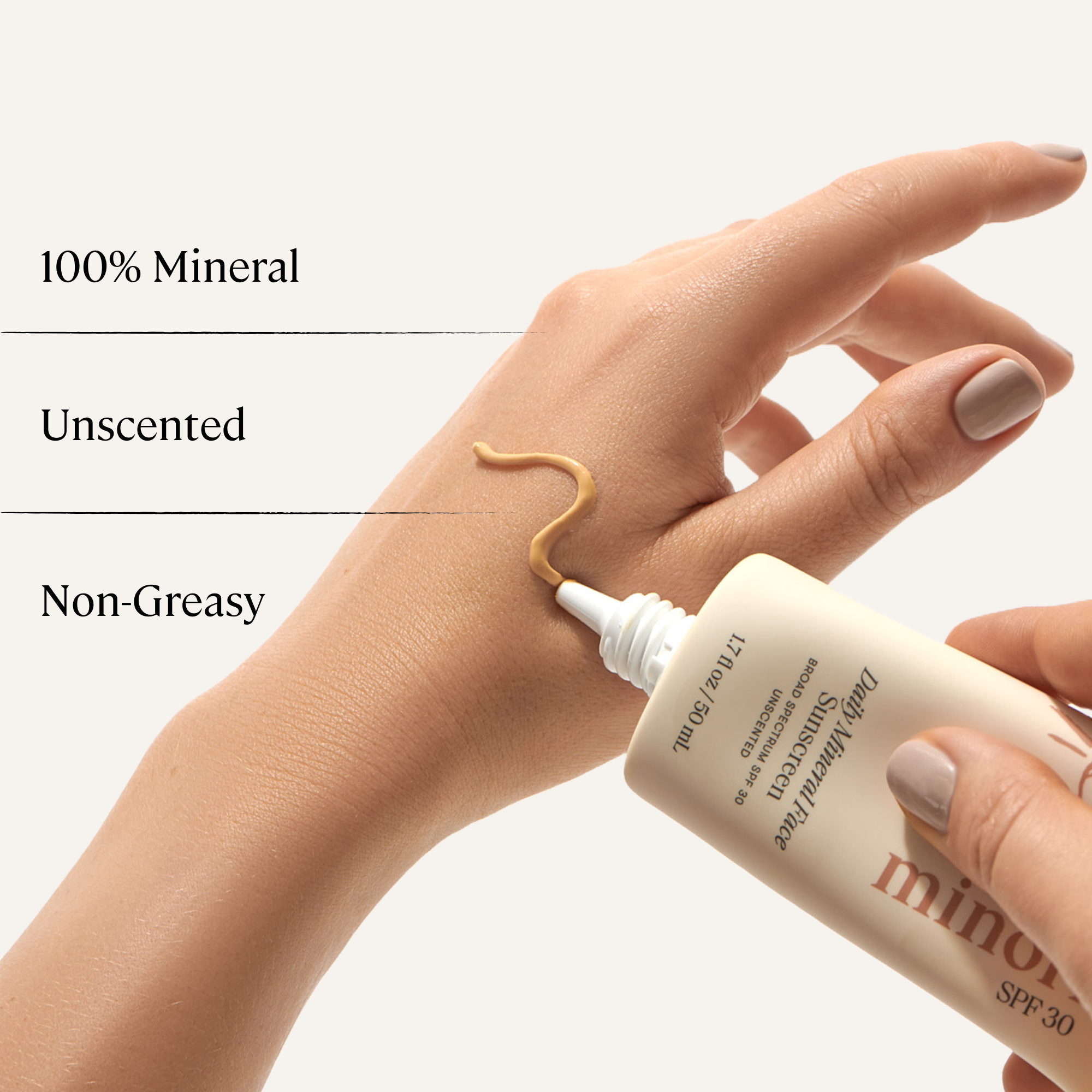 Hand applying a cosmetic product to skin with text highlighting features on a white background