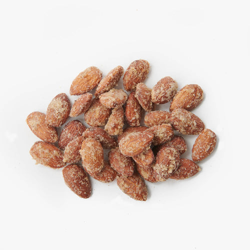 Pile of sugared almonds on a white background