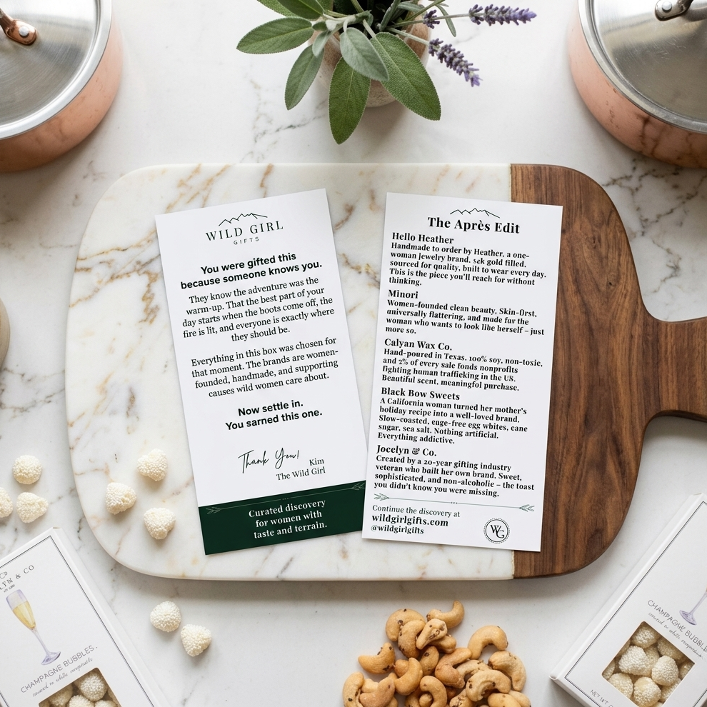 Wooden cutting board with product information cards on a marble surface with decorative items.