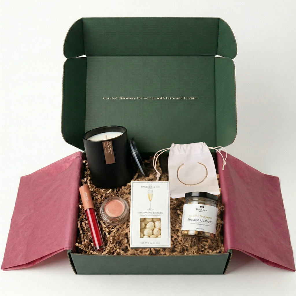 Wild Girl Gifts Après Edit gift box with Hello Heather gold bracelet, Calyan candle, and Minori beauty products
