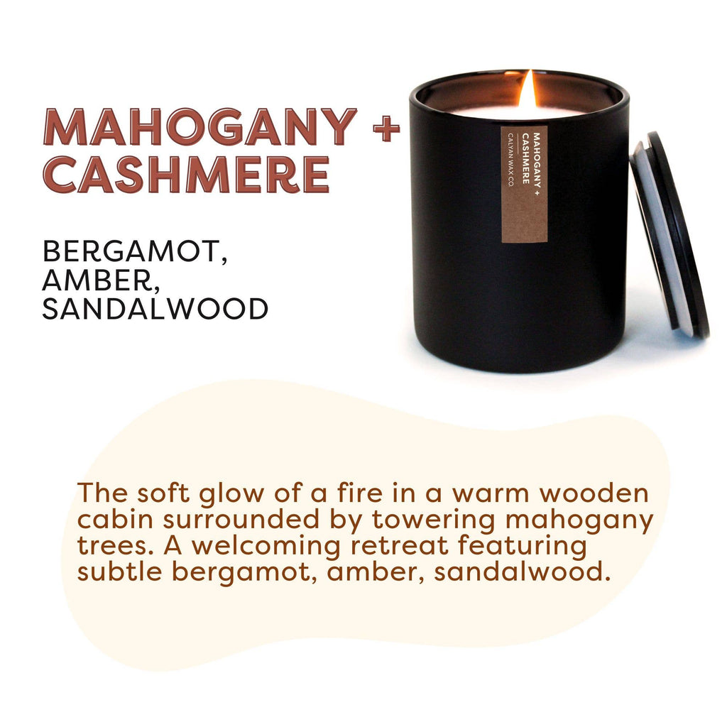 Candle labeled 'Mahogany + Cashmere' with description text on a white background